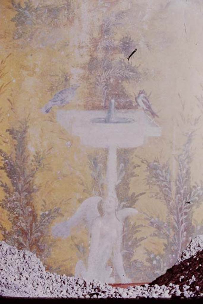 Oplontis, 1975. Room 70, painted square fountain from west wall, with plants and birds. Photo by Stanley A. Jashemski.   
Source: The Wilhelmina and Stanley A. Jashemski archive in the University of Maryland Library, Special Collections (See collection page) and made available under the Creative Commons Attribution-Non Commercial License v.4. See Licence and use details. J75f0058