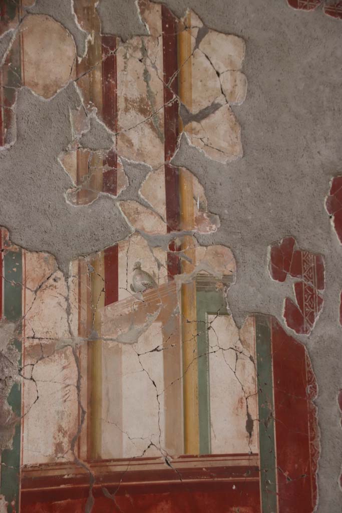Oplontis Villa of Poppea, September 2021. 
Room 81, detail of painted panel from west end of north wall. Photo courtesy of Klaus Heese.