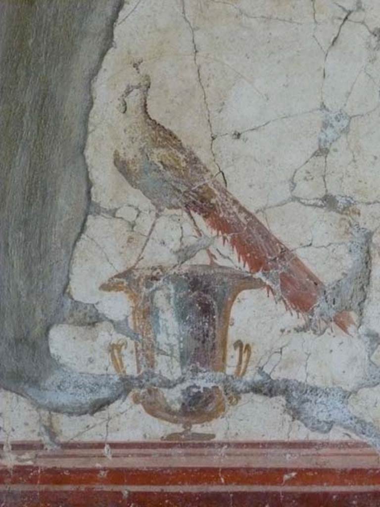 Oplontis, May 2011. Room 81, detail of painted peacock on vase, from south wall.. 
Photo courtesy of Michael Binns.