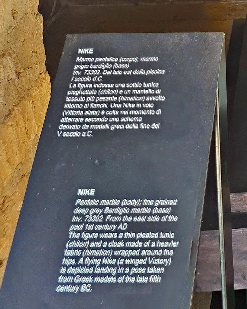 Oplontis Villa of Poppea, October 2023. 
Area 92/96, information card for marble statue of Nike found in 1983. Photo courtesy of Giuseppe Ciaramella.