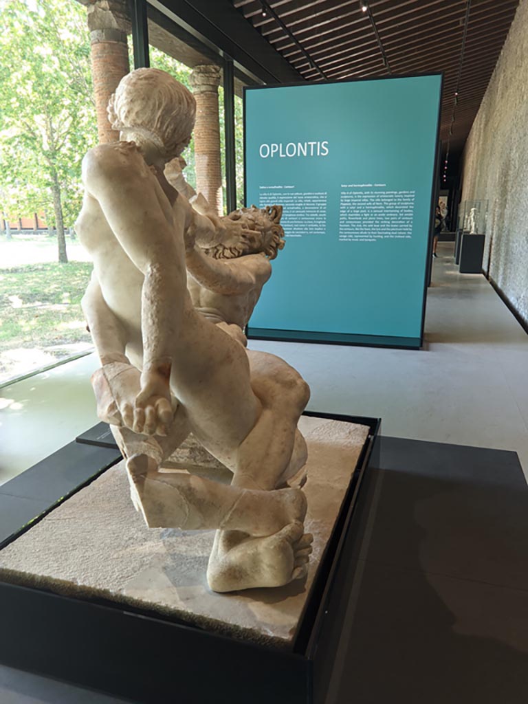 Oplontis Villa of Poppea, April 2022. 
Statuette of hermaphrodite and a faun, on display at II.7.9, the Palaestra in Pompeii.
Photo courtesy of Giuseppe Ciaramella.