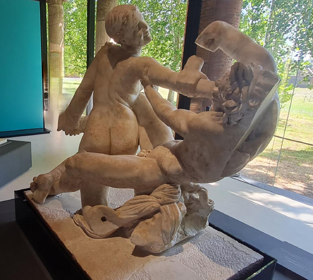Oplontis Villa of Poppea, April 2022. 
Statuette of hermaphrodite and a faun, on display at II.7.9, the Palaestra in Pompeii. Photo courtesy of Giuseppe Ciaramella.