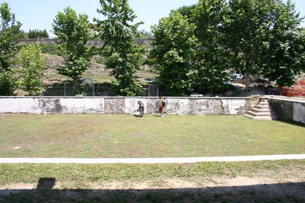 Oplontis Villa of Poppea, June 2008. Room 96, the swimming pool, looking east from 60 (with area 80 in the foreground of the image delineated by the white marble strip). 
In the far right, south east, corner are the steps into the pool.
Photo courtesy of Martin Blazeby.