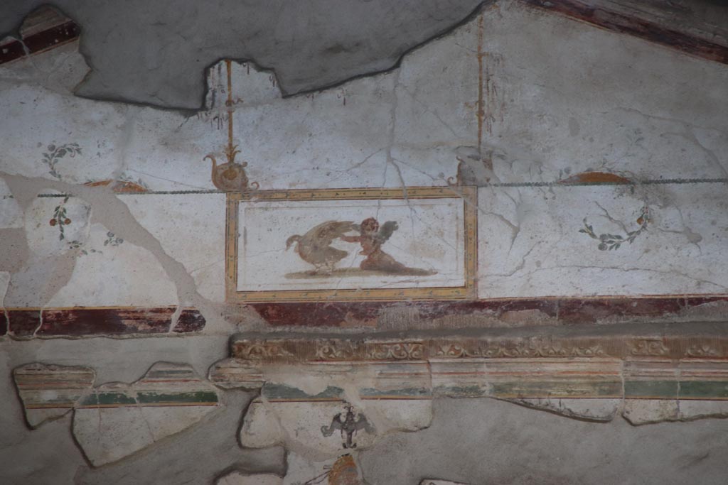 Villa of Poppaea, Oplontis, October 2023. 
Room 97, detail of reconstructed stucco from above doorway 97 on north wall of portico 60. Photo courtesy of Klaus Heese.