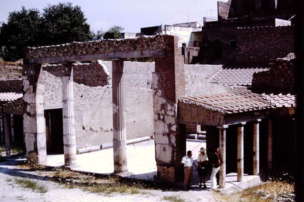 Oplontis, 1973. Wilhelmina in discussion in Portico 33 (13) on west side of large salon 21 (12). Photo by Stanley A. Jashemski. 
Source: The Wilhelmina and Stanley A. Jashemski archive in the University of Maryland Library, Special Collections (See collection page) and made available under the Creative Commons Attribution-Non Commercial License v.4. See Licence and use details. J73f0382