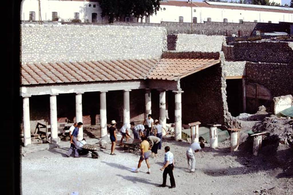 Oplontis Villa of Poppea, 1975 or 1974. Room 59, looking north-west across south-east peristyle. Photo by Stanley A. Jashemski.   
Source: The Wilhelmina and Stanley A. Jashemski archive in the University of Maryland Library, Special Collections (See collection page) and made available under the Creative Commons Attribution-Non Commercial License v.4. See Licence and use details. J74f0867
