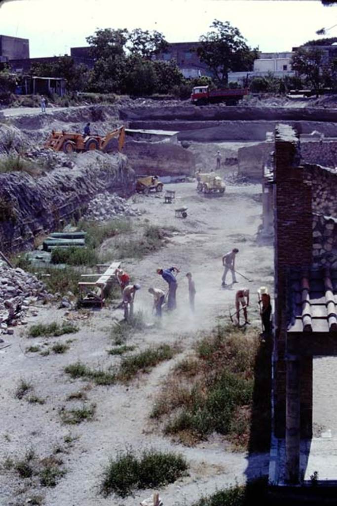 Oplontis Villa of Poppea, 1975. Looking east across the north garden, towards the gap in the wall of room 69, from near the north side of room 33, the west portico. Photo by Stanley A. Jashemski.   
Source: The Wilhelmina and Stanley A. Jashemski archive in the University of Maryland Library, Special Collections (See collection page) and made available under the Creative Commons Attribution-Non Commercial License v.4. See Licence and use details. J75f0030