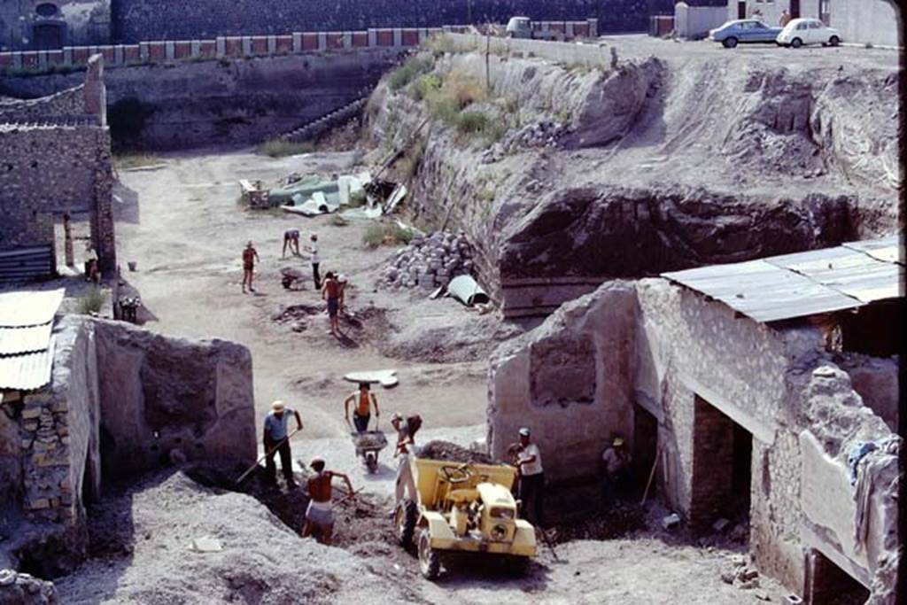 Oplontis, 1975. Looking west across room 69, with doorways to rooms 71/70/72, on the right.  Photo by Stanley A. Jashemski.   
Source: The Wilhelmina and Stanley A. Jashemski archive in the University of Maryland Library, Special Collections (See collection page) and made available under the Creative Commons Attribution-Non Commercial License v.4. See Licence and use details. J75f0173