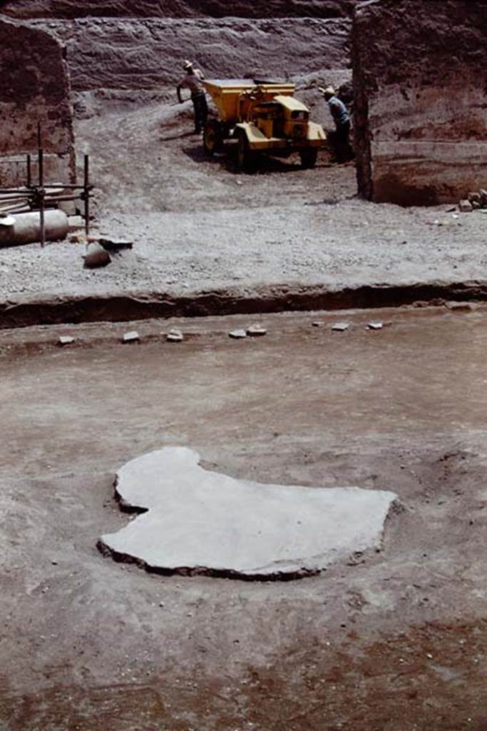 Oplontis, 1975. Looking east across filled root cavity, towards doorway to room 69. Photo by Stanley A. Jashemski.   
Source: The Wilhelmina and Stanley A. Jashemski archive in the University of Maryland Library, Special Collections (See collection page) and made available under the Creative Commons Attribution-Non Commercial License v.4. See Licence and use details. J75f0230