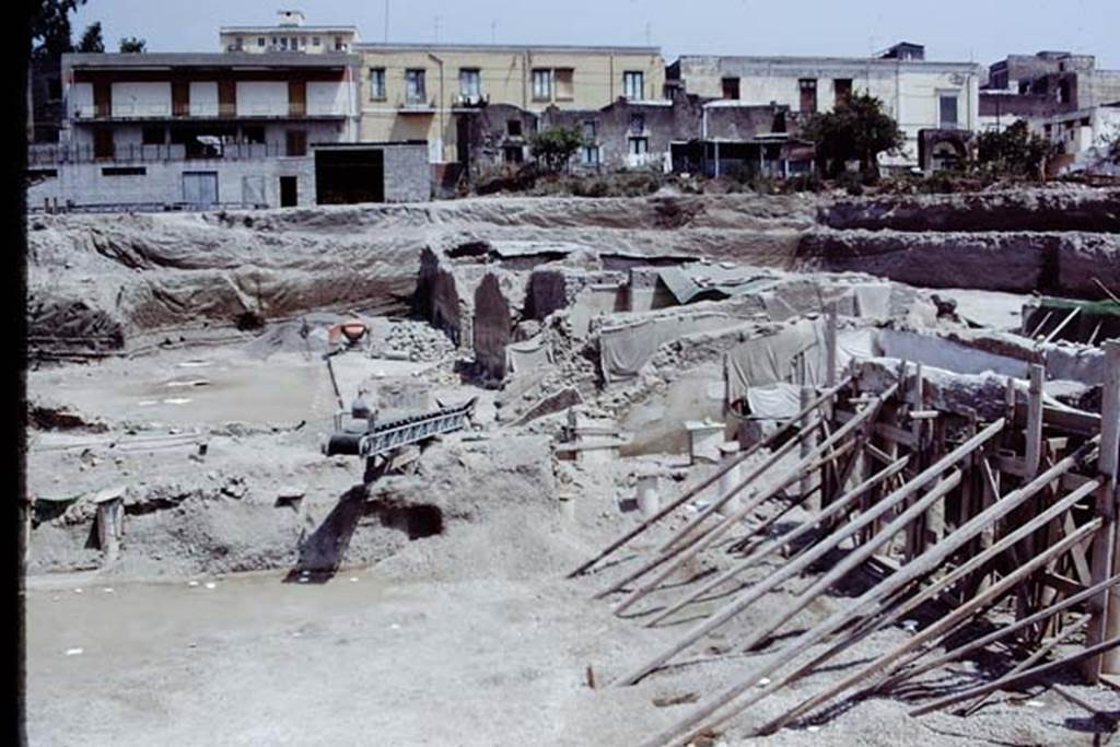 Oplontis, 1975. Looking north-east from area 59 the south-east peristyle, towards the rooms on the east side of the villa. Photo by Stanley A. Jashemski.   
Source: The Wilhelmina and Stanley A. Jashemski archive in the University of Maryland Library, Special Collections (See collection page) and made available under the Creative Commons Attribution-Non Commercial License v.4. See Licence and use details. J75f0478