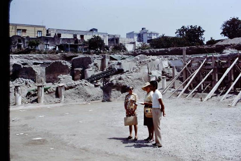 Oplontis, 1975. Looking north-east from area 59 the south-east peristyle, towards the rooms on the east side of the villa. Photo by Stanley A. Jashemski.   
Source: The Wilhelmina and Stanley A. Jashemski archive in the University of Maryland Library, Special Collections (See collection page) and made available under the Creative Commons Attribution-Non Commercial License v.4. See Licence and use details. J75f0479