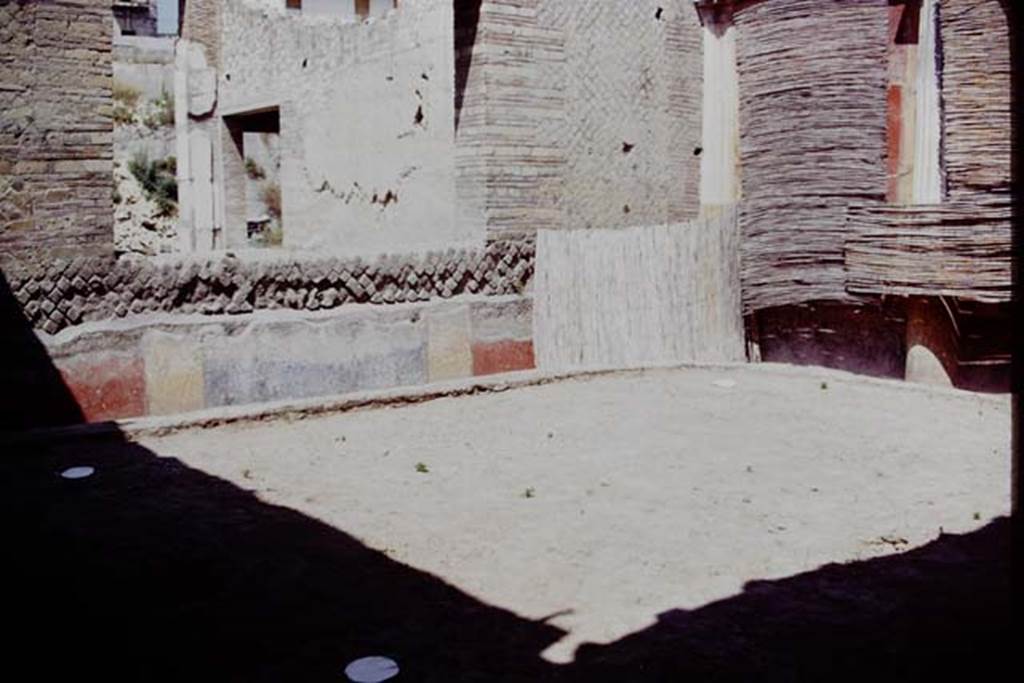 Oplontis, 1975. Area 20, the enclosed garden, looking towards the north-east corner. 
In the north-west, north-east and south-west corners a root cavity was found.
There was not one found in the south-east corner as this would have blocked the entrance to the garden. Photo by Stanley A. Jashemski.   
Source: The Wilhelmina and Stanley A. Jashemski archive in the University of Maryland Library, Special Collections (See collection page) and made available under the Creative Commons Attribution-Non Commercial License v.4. See Licence and use details. J75f0524
