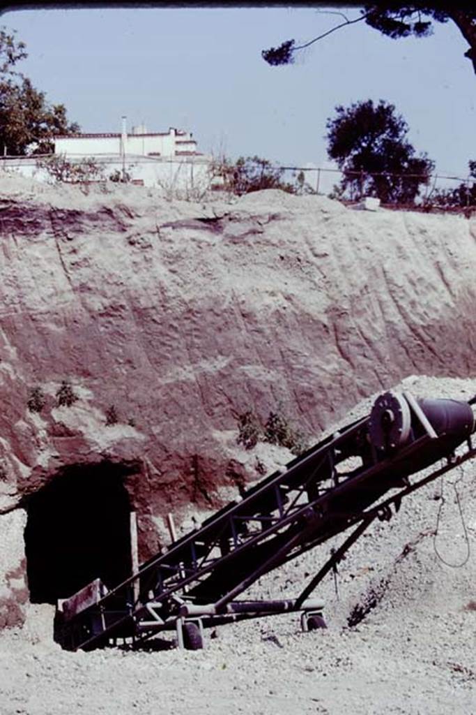 Oplontis, 1977. Digging out the debris on the east side. Photo by Stanley A. Jashemski.   
Source: The Wilhelmina and Stanley A. Jashemski archive in the University of Maryland Library, Special Collections (See collection page) and made available under the Creative Commons Attribution-Non Commercial License v.4. See Licence and use details. J77f0114