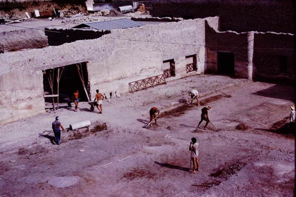 Oplontis, 1977. Looking south-east across east end of north garden. In this photo, the edge of the portico along the garden’s east side is being seached for root-cavities.  Photo by Stanley A. Jashemski.   
Source: The Wilhelmina and Stanley A. Jashemski archive in the University of Maryland Library, Special Collections (See collection page) and made available under the Creative Commons Attribution-Non Commercial License v.4. See Licence and use details. J77f0232