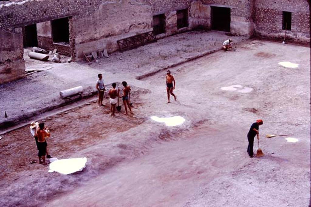 Oplontis, 1977. Cleaning up the area for the balloon photos. Photo by Stanley A. Jashemski.   
Source: The Wilhelmina and Stanley A. Jashemski archive in the University of Maryland Library, Special Collections (See collection page) and made available under the Creative Commons Attribution-Non Commercial License v.4. See Licence and use details. J77f0242