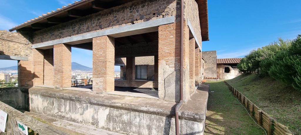 Stabiae, Villa Arianna, December 2023. 
Looking east to rear of Triclinium A, with the unexcavated, on the right. Photo courtesy of Miriam Colomer.