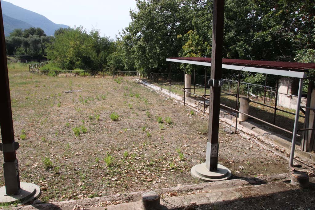 Stabiae, Villa Arianna, September 2021. 
Looking west through window onto Portico H and the large peristyle. Photo courtesy of Klaus Heese.