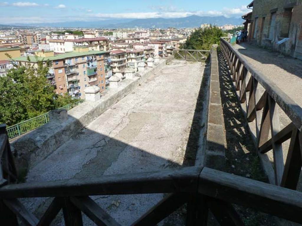 Stabiae, Villa Arianna, September 2015. 
Looking east from steps towards terrace B on left, and loggia 54 outside of the rooms of the Villa, on right.