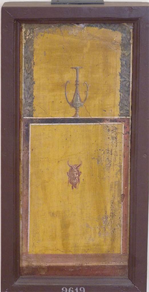 Stabiae, Villa Arianna, found 3rd January 1761. Room E, painting of compartment with a mask of Pan and kantharos above.
Now in Naples Archaeological Museum. Inventory number 9619.
See Sampaolo V. and Bragantini I., Eds, 2009. La Pittura Pompeiana. Electa: Verona, p. 476.