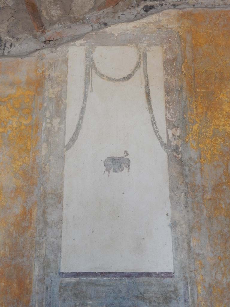 Stabiae, Villa Arianna, June 2019. Room 11, white painted upper central panel on south wall.
Photo courtesy of Buzz Ferebee.