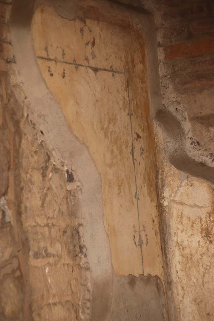 Stabiae, Villa Arianna, October 2020.Room 12, detail from upper east wall in south-east corner. 
Photo courtesy of Klaus Heese.