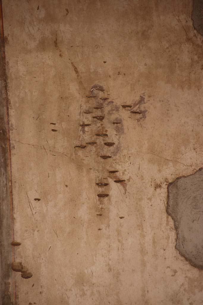 Stabiae, Villa Arianna, October 2020. 
Room 12, detail of figure at centre of south wall at west end. Photo courtesy of Klaus Heese.