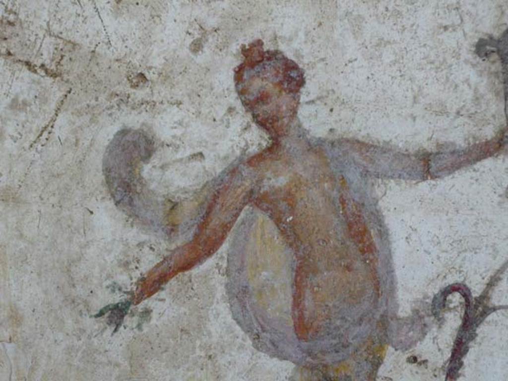 Stabiae, Villa Arianna, May 2010. Room 12, painted figure on panel on west wall. 
Photo courtesy of Buzz Ferebee.