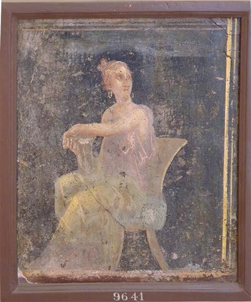 Stabiae, Villa Arianna, found in the zoccolo on 29th March 1760. Room 5, seated woman with arm resting on a silver vase or kantharos.
Now in Naples Archaeological Museum. Inventory number 9641.
According to Grasso, the presence of the border on the right of this picture indicates that it may have been found at the end of a wall, towards the door, to which she has turned her gaze.
See Sampaolo V. and Bragantini I., Eds, 2009. La Pittura Pompeiana. Electa: Verona, p. 465.
See Pagano, M. and Prisciandaro, R., 2006. Studio sulle provenienze degli oggetti rinvenuti negli scavi borbonici del regno di Napoli.  Naples: Nicola Longobardi, p. 245.
