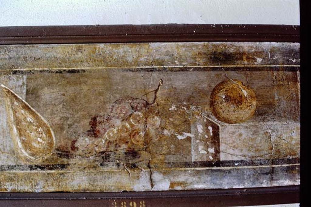 Stabiae, Villa Arianna, found 5th April 1760. Ante camera to room 3, painting of still life. 1968. Photo by Stanley A. Jashemski.
Source: The Wilhelmina and Stanley A. Jashemski archive in the University of Maryland Library, Special Collections (See collection page) and made available under the Creative Commons Attribution-Non Commercial License v.4. See Licence and use details.
J68f0797
Now in Naples Archaeological Museum. Inventory number 8688 
(Note – in this photo, the number on the frame appears to be 8898 but the frame is on upside down).
