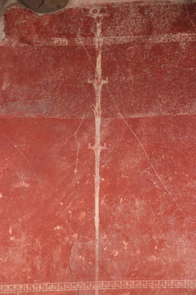 Stabiae, Villa Arianna, October 2020. 
W30, detail of painted candelabra on east wall in south-east corner of small peristyle W29. Photo courtesy of Klaus Heese.