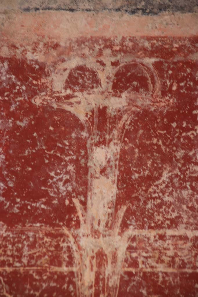 Stabiae, Villa Arianna, October 2020. 
W30, detail of top of painted candelabra on east wall in south-east corner of small peristyle W29. Photo courtesy of Klaus Heese. 
205 Villa di Arianna - Raum W30 - Ostwand - re - Detail.