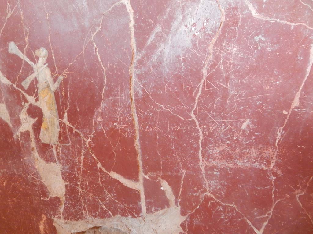 Stabiae, Villa Arianna, June 2019. W.28, painted female figure and graffiti on south wall.
Photo courtesy of Buzz Ferebee.