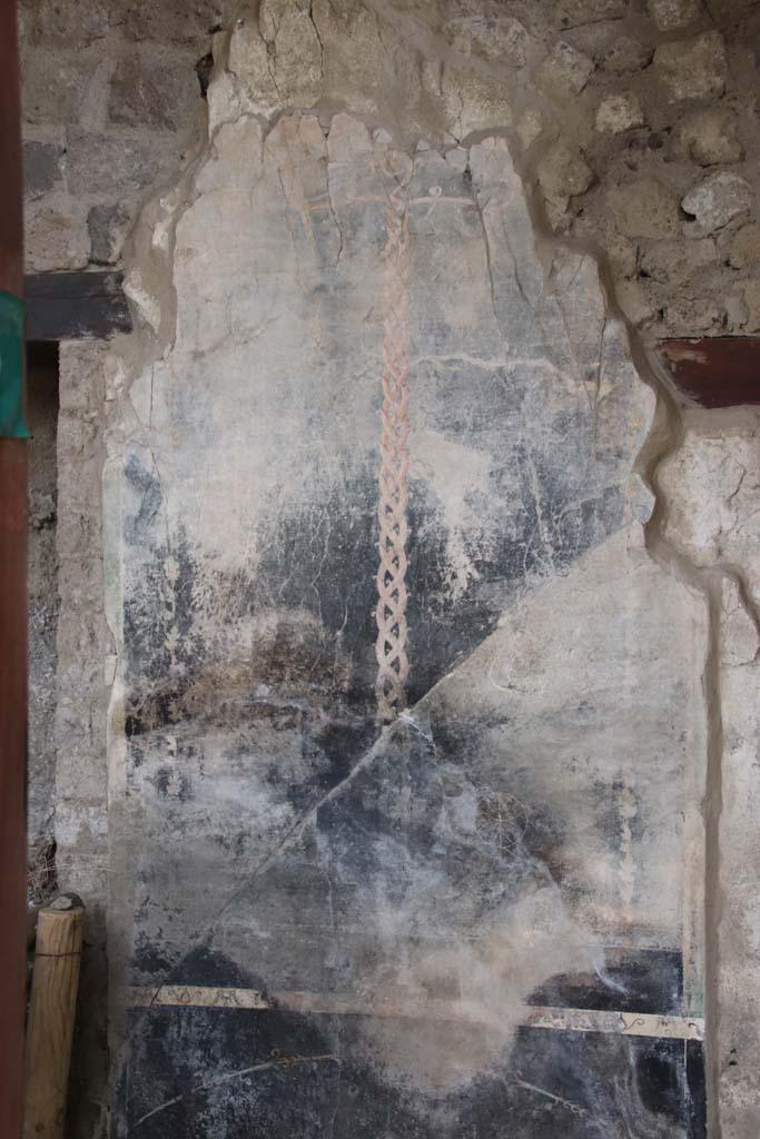 Stabiae, Villa Arianna, September 2021. 
W.22, west portico of courtyard, painted decoration between rooms W.26 and corridor W.27. 
Photo courtesy of Klaus Heese.