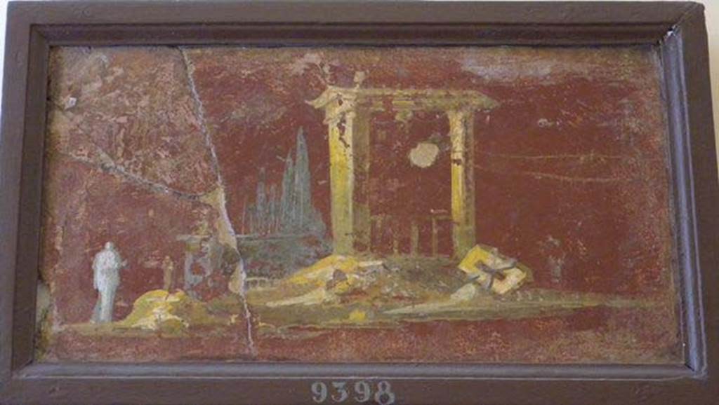 Stabiae, Villa Arianna, found 6th August 1759. Room W.26? 
Wall painting of landscape with a tall shrine with double sloping roof. On the left is a cloaked figure.
Now in Naples Archaeological Museum. Inventory number 9398.
See Sampaolo V. and Bragantini I., Eds, 2009. La Pittura Pompeiana. Electa: Verona, p. 454-5.
See Pagano, M. and Prisciandaro, R., 2006. Studio sulle provenienze degli oggetti rinvenuti negli scavi borbonici del regno di Napoli.  Naples: Nicola Longobardi, p. 243.