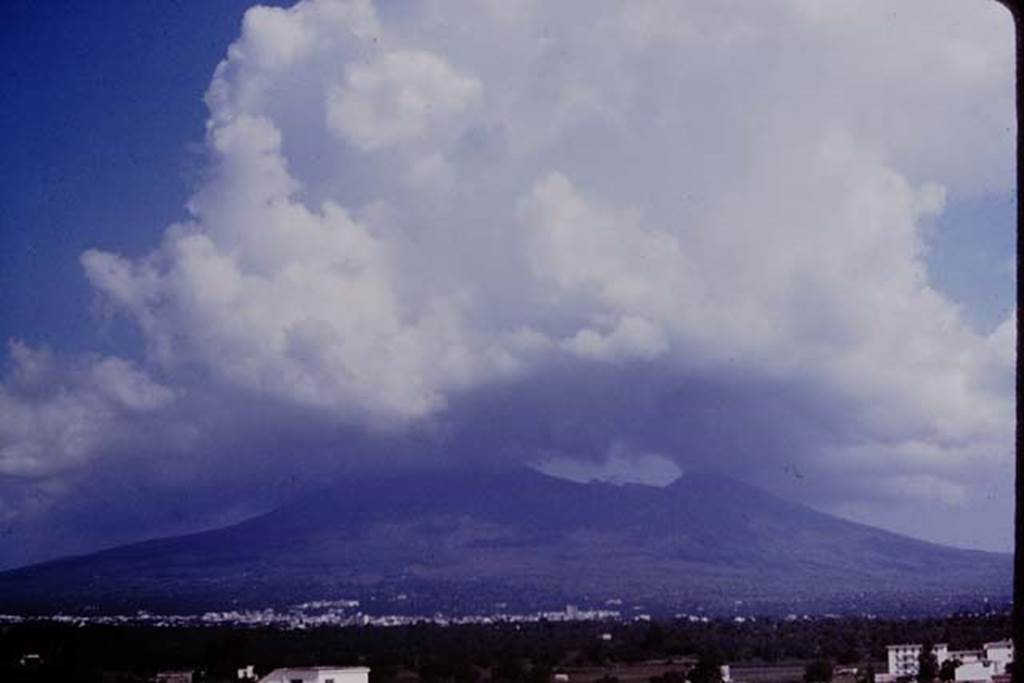 Vesuvius in the clouds. 1964.  Photo by Stanley A. Jashemski.
Source: The Wilhelmina and Stanley A. Jashemski archive in the University of Maryland Library, Special Collections (See collection page) and made available under the Creative Commons Attribution-Non-commercial License v.4. See Licence and use details.
J64f1390
