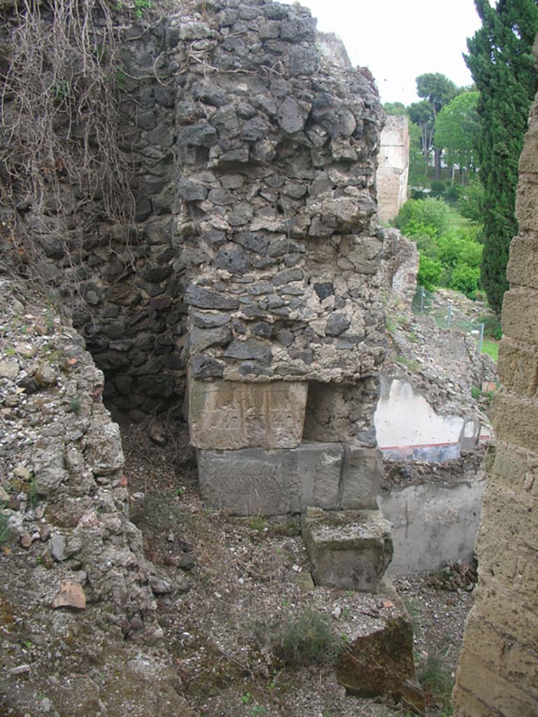 VIII.2.A Pompeii. May 2010. 
Looking east towards detail of walling at west end. Photo courtesy of Ivo van der Graaff.