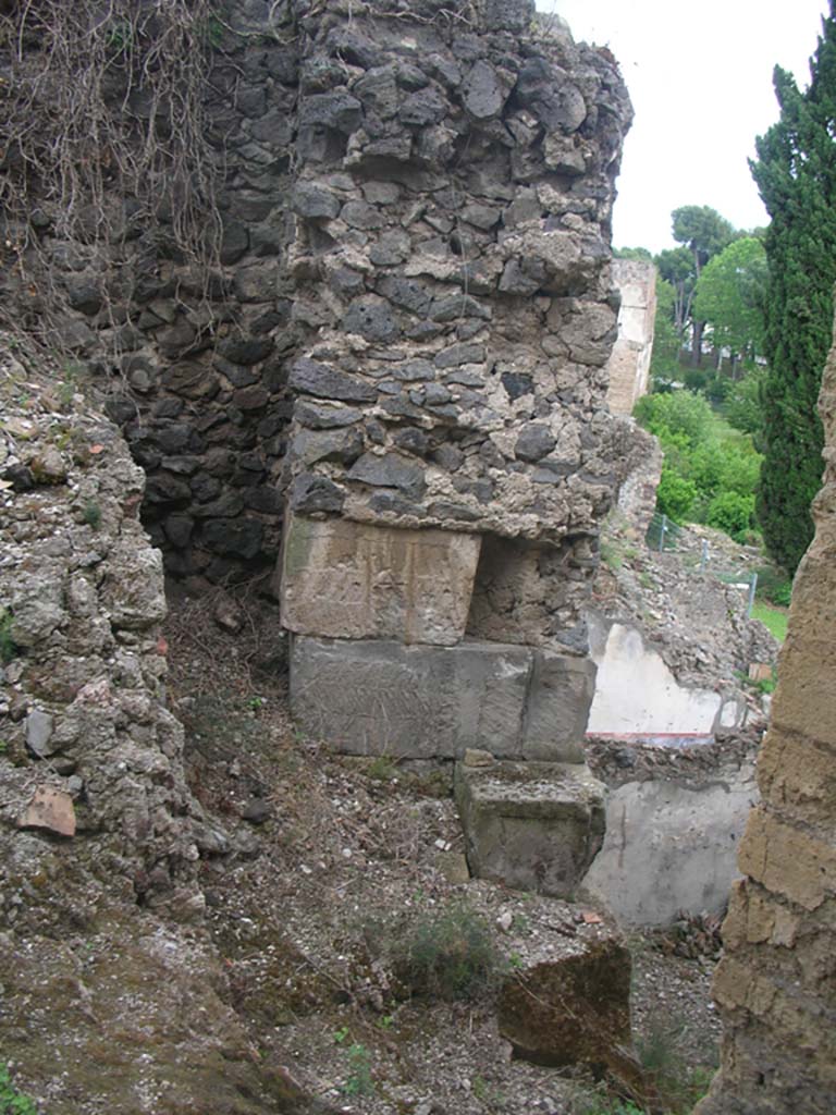 VIII.2.A Pompeii. May 2010. 
Looking east towards detail of walling at west end. Photo courtesy of Ivo van der Graaff.