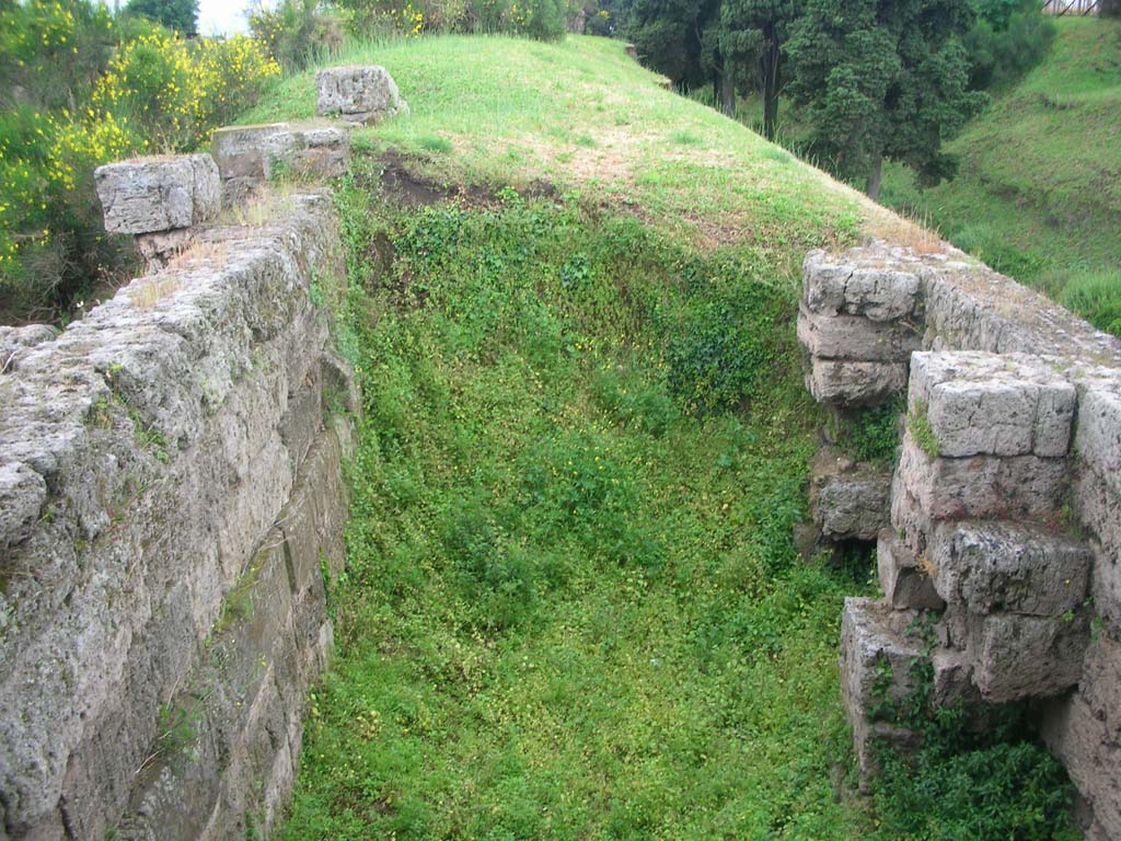 Tower XI, Pompeii. May 2010. 
Looking west with detail of area between the walls on west side of Tower. Photo courtesy of Ivo van der Graaff.