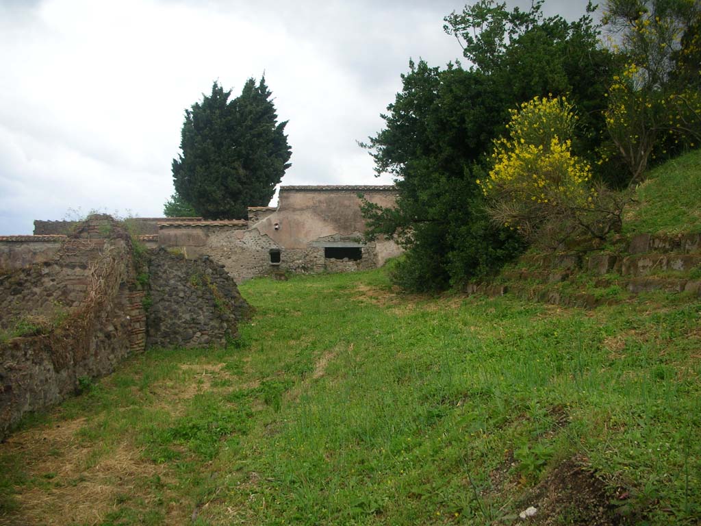 City Walls on north side of Pompeii. May 2010. 
Agger on south side of City Wall, on right, looking west towards VI.1.26. Photo courtesy of Ivo van der Graaff.