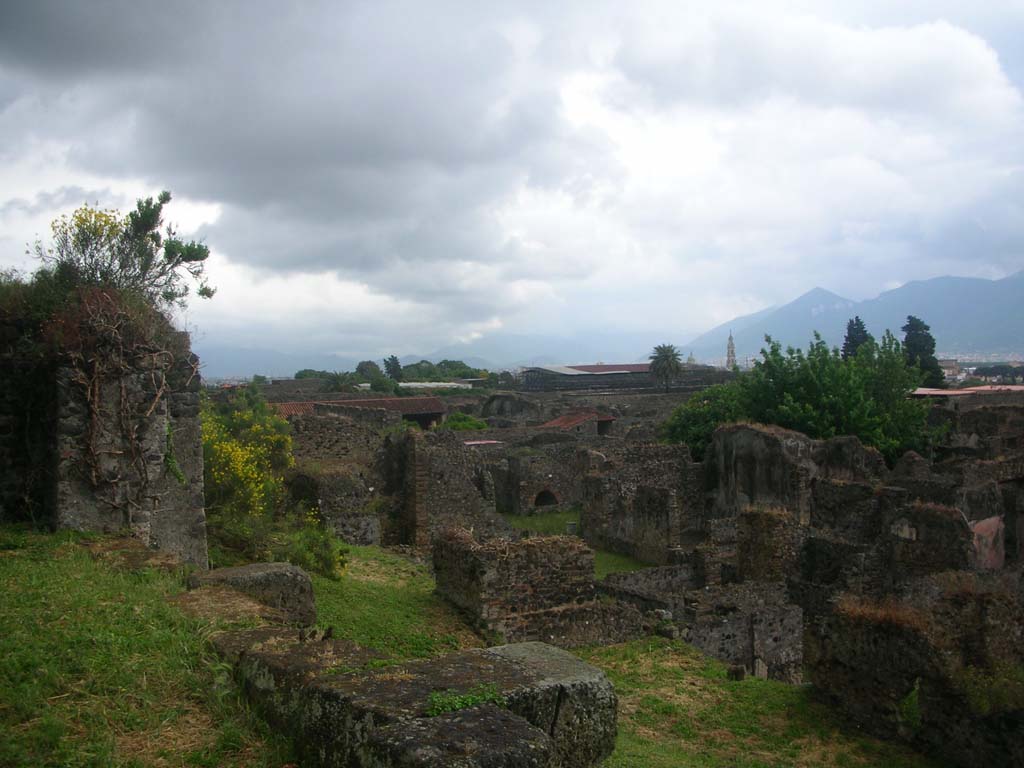 Tower XII, Pompeii, on left. May 2010. 
Looking south-east from top of city wall towards VI.2, Pompeii. Photo courtesy of Ivo van der Graaff.