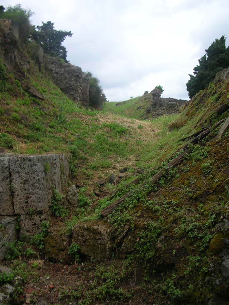 City Wall in north-west corner, Pompeii. May 2010. 
Looking east along line of top of City Wall, continuation from above photo. Photo courtesy of Ivo van der Graaff.