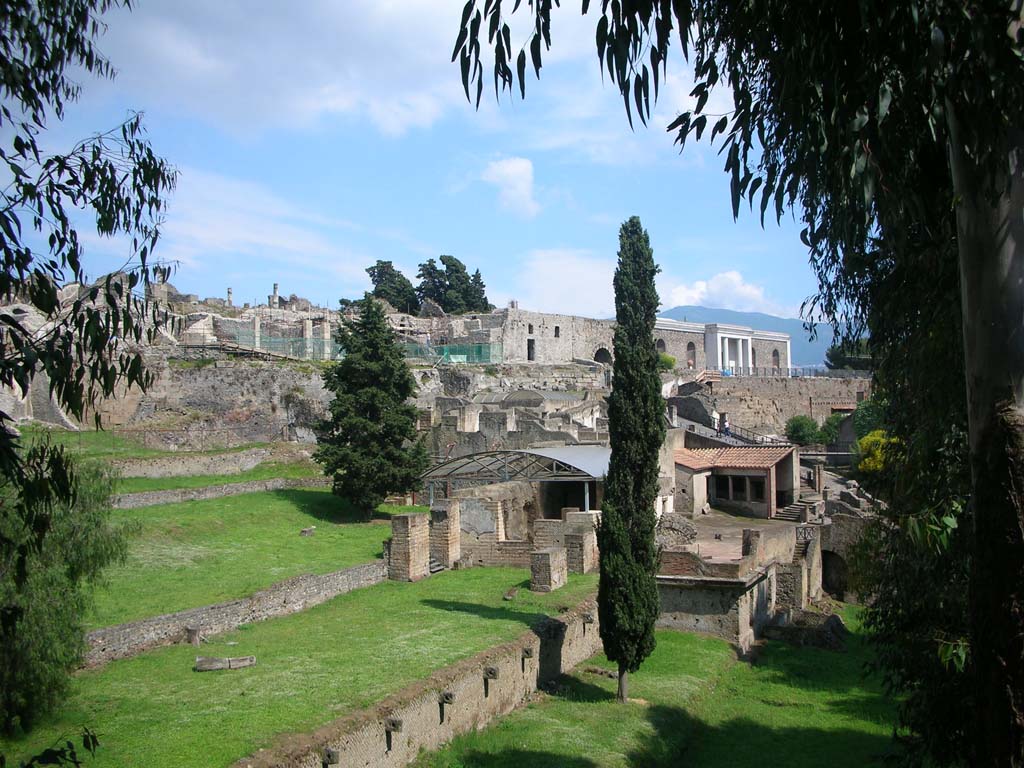 Walls on west side of Pompeii. May 2010. 
Looking south along City Walls, with VII.16.a Suburban Baths, lower right, Marine Gate and Antiquarium, upper right. 
Photo courtesy of Ivo van der Graaff.
