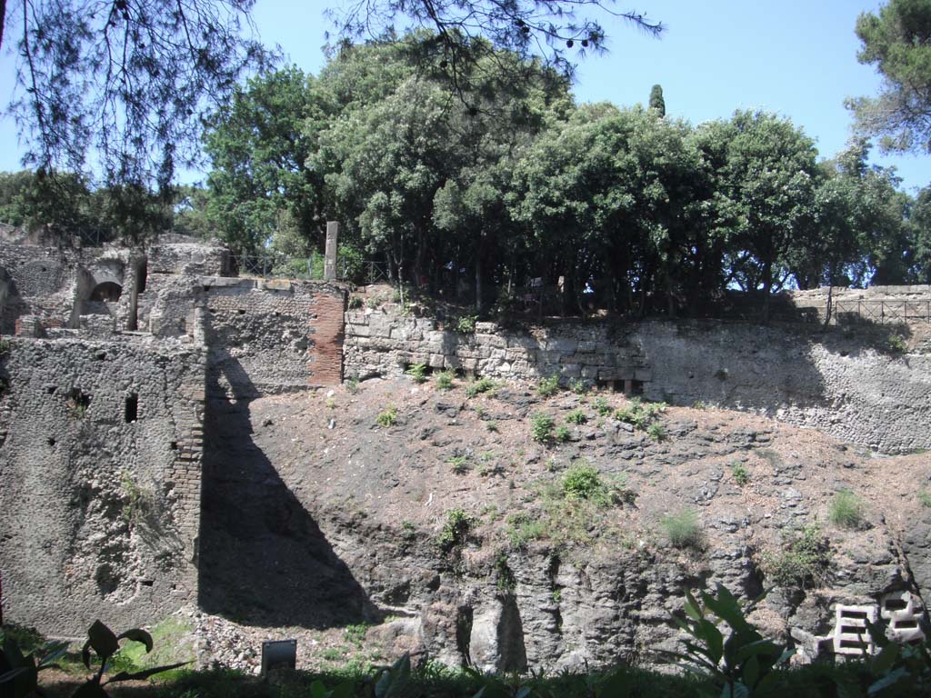 VIII.2.39 Pompeii, on left. June 2012.  
Looking north towards rear of Triangular Forum, centre and right. Photo courtesy of Ivo van der Graaff.