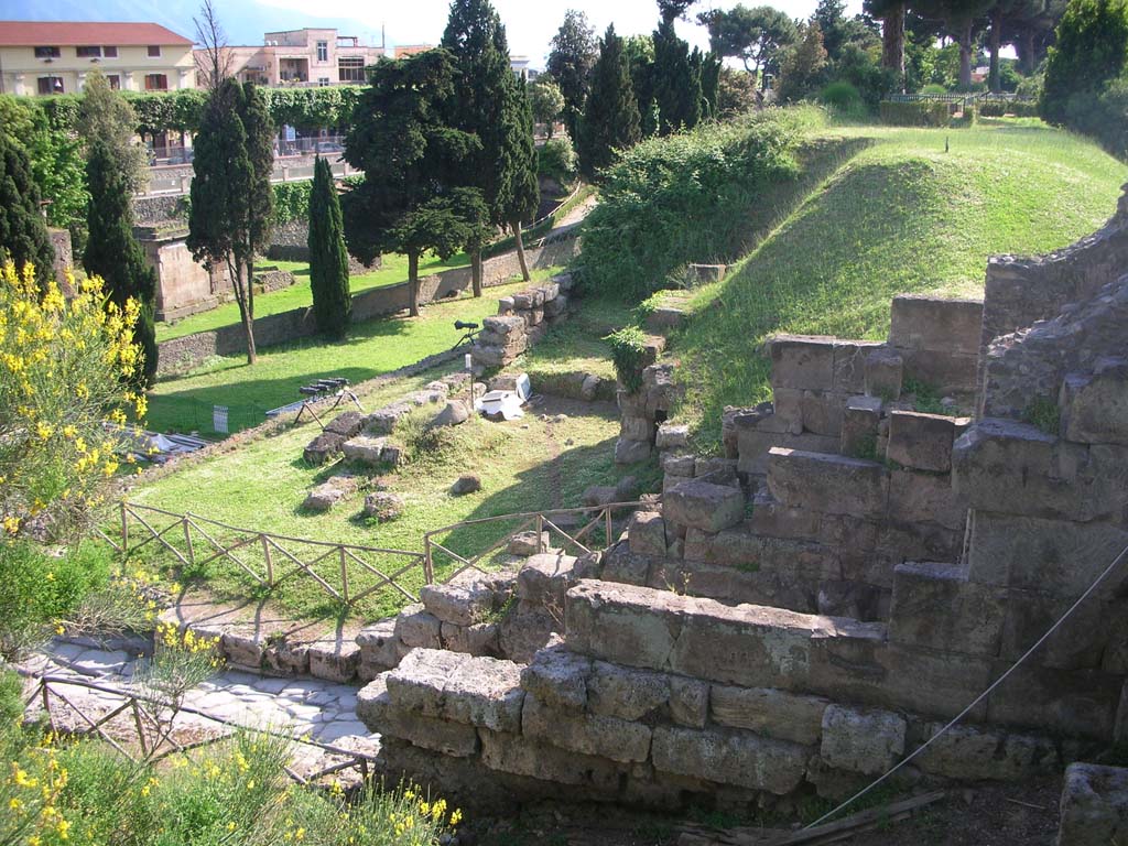 Porta Nocera, Pompeii. May 2010. 
Looking west towards Nocera Gate, on right, across agger towards city wall on south-west side of Gate. Photo courtesy of Ivo van der Graaff.