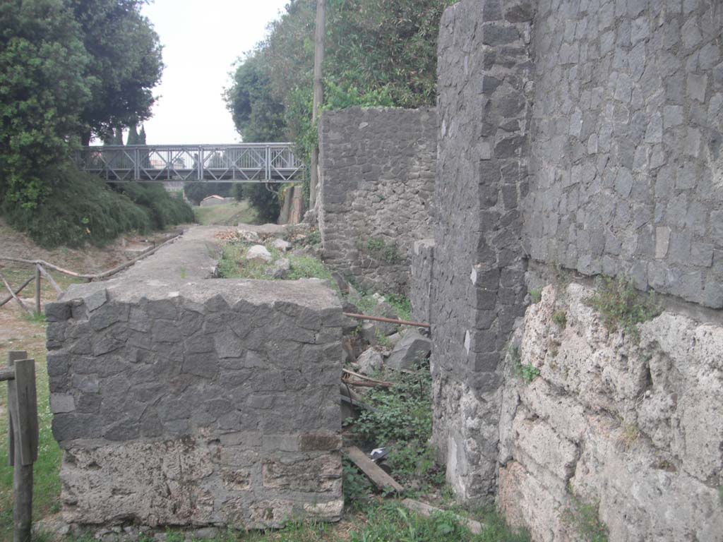 Walls on south side of City, May 2011. 
Looking west from Tower IV towards pedestrian access from Amphitheatre entrance to site. Photo courtesy of Ivo van der Graaff.