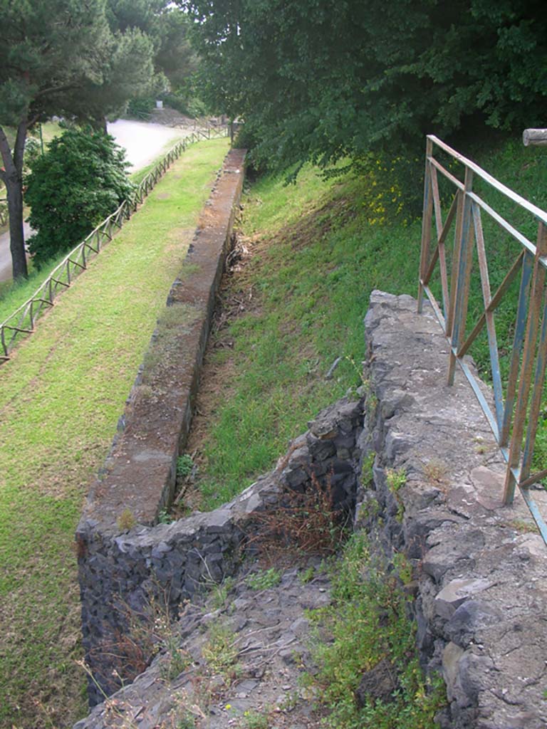 City Walls on south side, Pompeii. May 2010. 
Looking west along line of city walls towards Tower IV, from Tower V. Photo courtesy of Ivo van der Graaff.