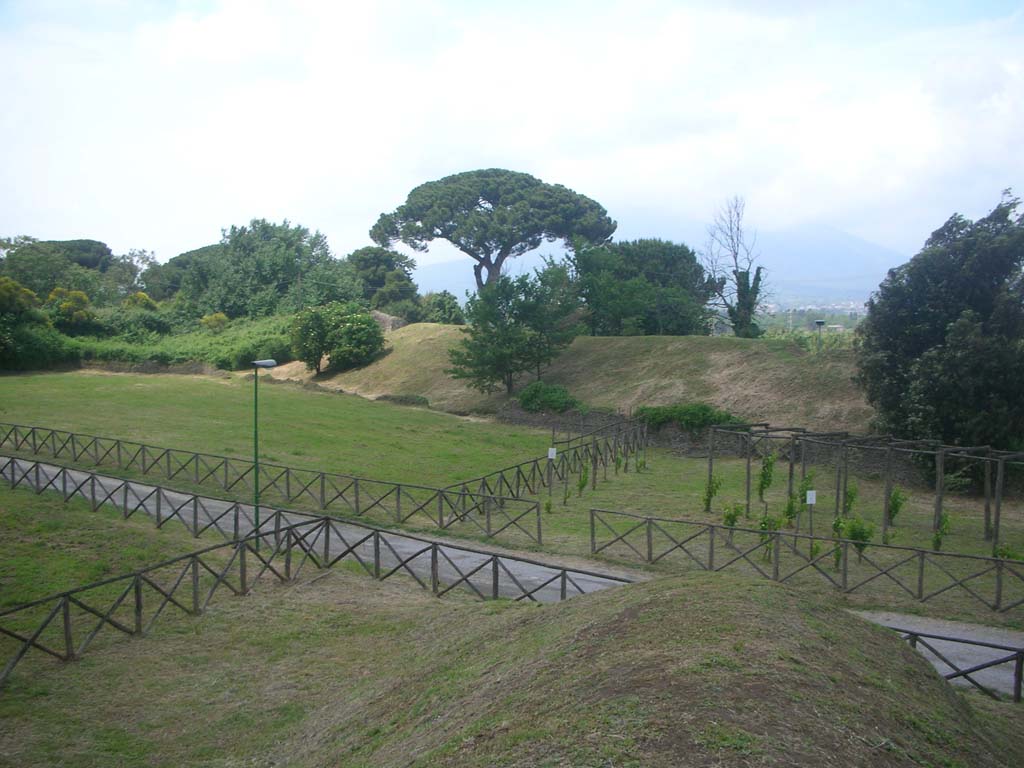 Walls on north side of Sarno Gate, Pompeii. May 2010. 
Looking towards remains of Tower VII, centre left. Photo courtesy of Ivo van der Graaff.