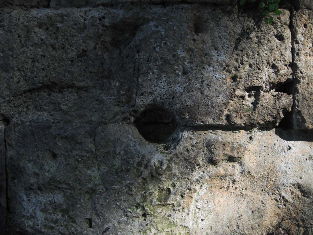 City Walls, Pompeii. June 2012. Indents from missiles on north exterior wall on east side of Tower X. Photo courtesy of Ivo van der Graaff.