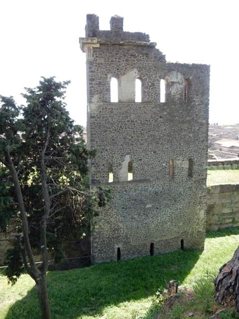Tower X, Pompeii. May 2015. Looking south to tower and city walls from walk around walls. 
Photo courtesy of Buzz Ferebee. 
See Notizie degli Scavi, 1943, (p.275-294), 
for article entitled “Isolation of the wall between Porta Vesuvius and Herculaneum Gate.”
(Isolamento della cinta murale fra Porta Vesuvio e Porta Ercolano).