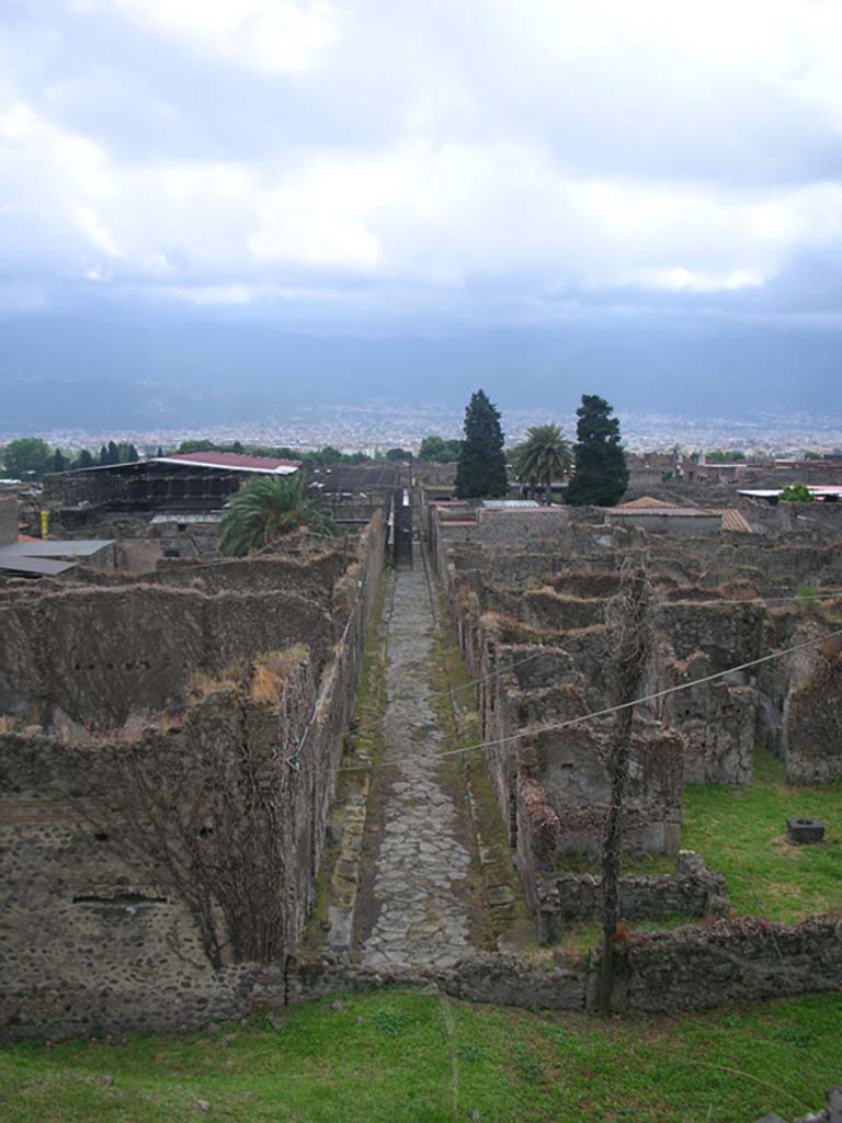 Vicolo del Labirinto, Pompeii. May 2010. 
Looking south from Tower X, with VI.15 on left, and VI.11 on right. Photo courtesy of Ivo van der Graaff.